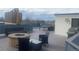 Spacious deck features a firepit, barbecue and outdoor seating area at 336 E 1St Ave # 310, Denver, CO 80203