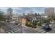 Street view featuring neighborhood houses, apartment buildings, and a crosswalk at 336 E 1St Ave # 310, Denver, CO 80203