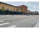 Busy street view showcasing local businesses and urban architecture at 336 E 1St Ave # 310, Denver, CO 80203