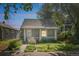 Charming home with a covered front porch and lovely front garden at 3968 Winona Ct, Denver, CO 80212