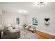 Bright living room with hardwood floors and modern decor at 3968 Winona Ct, Denver, CO 80212