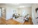 Cozy living room featuring a gray sofa, stylish decor, and lots of natural light at 3968 Winona Ct, Denver, CO 80212