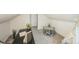Bright playroom has neutral carpet, play table with chairs, and teepee play tent at 3968 Winona Ct, Denver, CO 80212