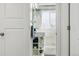 Bright bathroom featuring a modern white vanity, stylish subway tile, and a well-lit atmosphere at 2821 N Harrison St, Denver, CO 80205