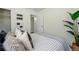 Inviting bedroom featuring neutral tones and a decorative plant at 2821 N Harrison St, Denver, CO 80205