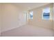 Bright bedroom with large closet and two windows that provide lots of natural light at 2466 S Cherokee St, Denver, CO 80223