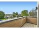 Rooftop deck showcasing wood railings, offering a pleasant outdoor space and scenic views at 2466 S Cherokee St, Denver, CO 80223