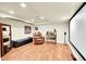 Finished basement with home theater, projector, leather chair and bar at 6765 S Independence St, Littleton, CO 80128