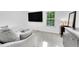 Bonus room features media center, neutral decor, and lots of light at 6765 S Independence St, Littleton, CO 80128