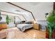 Bedroom with hardwood floors and vaulted ceilings at 21 Snowmass Pl, Longmont, CO 80504