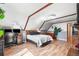 Bedroom with hardwood floors and a desk at 21 Snowmass Pl, Longmont, CO 80504
