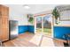 Bright dining area with sliding glass doors and plants for natural lighting at 21 Snowmass Pl, Longmont, CO 80504