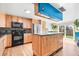 Spacious kitchen with wood cabinets, stainless steel appliances, and natural lighting at 21 Snowmass Pl, Longmont, CO 80504