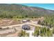 Mountain community home featuring a modern design with a hot tub, and mountain views at 499 Silver Creek Rd, Idaho Springs, CO 80452