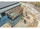 The outdoor hot tub and fire pit area with seating is perfect for relaxing and entertaining at 499 Silver Creek Rd, Idaho Springs, CO 80452