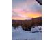 Picturesque mountain view at sunset with winter snow foreground and propane tank at 499 Silver Creek Rd, Idaho Springs, CO 80452