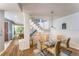Bright dining area with modern table and staircase views provides an elegant setting for meals and entertaining at 461 Fillmore St, Denver, CO 80206