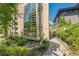 Modern building with large glass window feature and beautiful landscaping at 461 Fillmore St, Denver, CO 80206