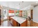 Modern kitchen features sleek cabinets, a large island, and stainless steel appliances for a contemporary cooking experience at 461 Fillmore St, Denver, CO 80206