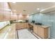 Custom office with a granite countertop and unique frosted glass door and panels at 461 Fillmore St, Denver, CO 80206