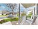 Inviting front porch with rocking chairs, offering a relaxing outdoor space at 5308 S Ukraine St, Aurora, CO 80015