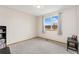 Minimalist bedroom with gray carpet, natural light, and clean lines, perfect for relaxation at 16478 Marion St, Thornton, CO 80602