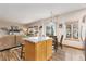 Eat-in kitchen with a center island and plenty of natural light at 16478 Marion St, Thornton, CO 80602