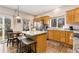 Modern kitchen with granite countertops and stainless steel appliances at 16478 Marion St, Thornton, CO 80602