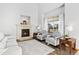 Comfortable living room with a fireplace, perfect for relaxing at 16478 Marion St, Thornton, CO 80602