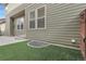 The backyard features a side yard with synthetic grass, an egress window, and durable composite siding at 368 Dallas St, Denver, CO 80230