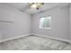 Neutral bedroom featuring carpeting, a single window and overhead fan at 368 Dallas St, Denver, CO 80230