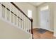 Entryway with hardwood floors, staircase and bright natural light, creating a welcoming atmosphere at 368 Dallas St, Denver, CO 80230