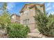 Front view of a two-story home showcasing its brick facade, inviting entry and manicured surroundings at 368 Dallas St, Denver, CO 80230
