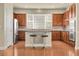 Beautiful kitchen featuring granite countertops, stainless steel appliances, and a convenient breakfast bar at 368 Dallas St, Denver, CO 80230