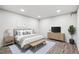 Minimalist bedroom with neutral tones, soft lighting, and a cozy inviting atmosphere at 5008 Alcott St, Denver, CO 80221