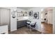 Charming kitchen nook with stylish cabinetry, open shelving, and space for casual dining at 5008 Alcott St, Denver, CO 80221