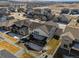 An aerial view of the house, backyard, and covered patio, showcasing the landscape at 5861 Tesoro Pt, Parker, CO 80134
