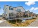 Spacious backyard with a trampoline and access to the covered patio, perfect for outdoor entertaining at 5861 Tesoro Pt, Parker, CO 80134