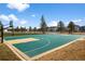 A community basketball court with well-maintained playing surface and hoops, great for recreation at 5861 Tesoro Pt, Parker, CO 80134