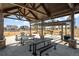 Community pavilion with picnic tables and barbecue grills, perfect for neighborhood gatherings at 5861 Tesoro Pt, Parker, CO 80134