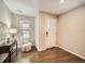 Inviting entryway featuring hardwood floors, a stylish console table, and a window for natural light at 5435 W 97Th Pl, Broomfield, CO 80020