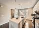 Spacious kitchen island with seating and modern appliances, creating a perfect space for entertaining at 5435 W 97Th Pl, Broomfield, CO 80020