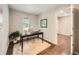 Bright home office with a large window, a modern desk, and hardwood floors, perfect for remote work at 5435 W 97Th Pl, Broomfield, CO 80020
