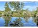 Enjoy the serene view of the pond from your home with beautiful greenery at 5435 W 97Th Pl, Broomfield, CO 80020