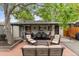 Inviting outdoor patio with ample seating, ideal for relaxing and entertaining guests at 2967 Olive St, Denver, CO 80207