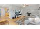 Cozy living room featuring stylish decor, hardwood floors, and natural light at 2967 Olive St, Denver, CO 80207