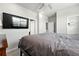 Bedroom with a ceiling fan, closet, and ensuite bathroom at 6988 Ipswich Ct, Castle Pines, CO 80108
