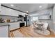 Updated kitchen with stainless steel appliances, breakfast nook, and modern design at 1705 S Yuma St, Denver, CO 80223