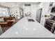 Gourmet kitchen featuring white counters, stainless steel appliances and open access to the living area at 8358 Howell St # B, Arvada, CO 80005