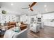 The open-concept living area combines relaxation and dining, creating a perfect gathering space at 8358 Howell St # B, Arvada, CO 80005